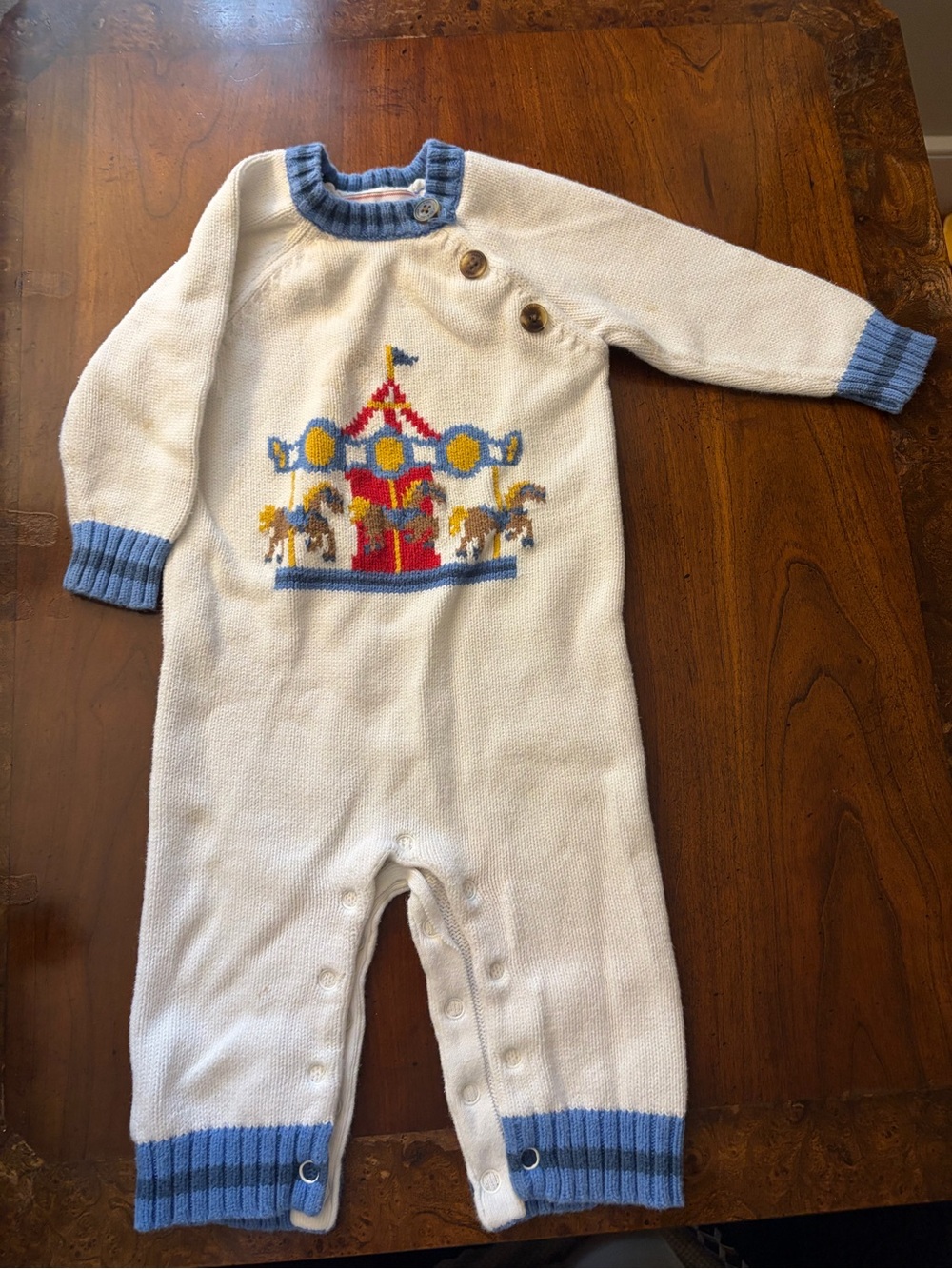 Classic Prep Cream Knit One-Piece with Blue Trim and Carousel Motif